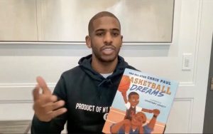 Phoenix Suns guard Chris Paul has streamed virtual read-along sessions of his children's book, "Basketball Dreams," to hundreds of classrooms. Recently, he met with students from an Atlanta elementary school during a road trip. (Photo courtesy of Atlanta Public Schools)