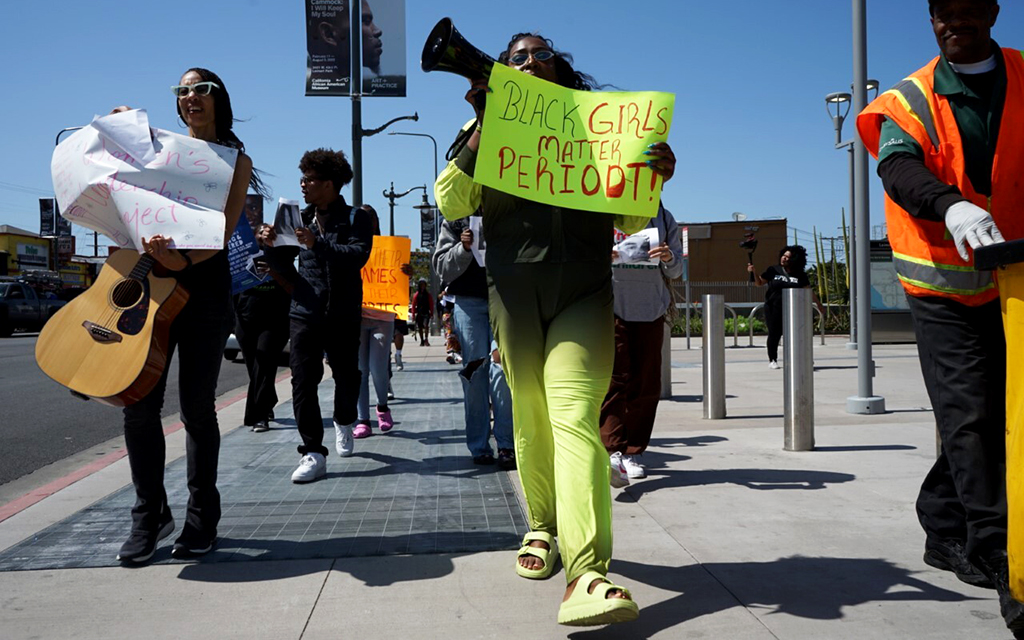 Event-goers marched around Leimert Park chanting, “We’re standing for Black girls!” (Photo by Ayana Hamilton/Cronkite News)