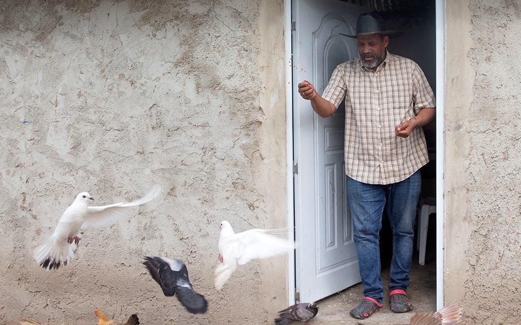 Dajabón Mayor Santiago Riverón stands outside a door in his home near his town in the Dominican Republic on March 4, 2023. (Photo by Roxanne De La Rosa/Cronkite Borderlands Project)