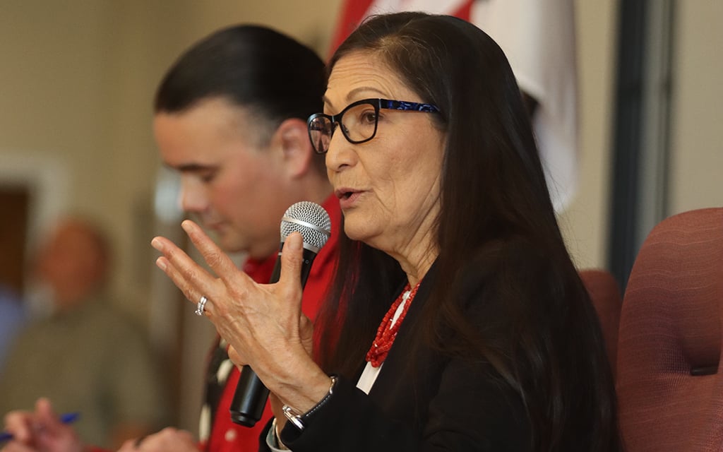 In summer 2022, Interior Secretary Deb Haaland began a year-long “Road to Healing” tour across the U.S. to hear the experiences of Native Americans sent to government-backed boarding schools. Haaland said she wanted to address the experiences of former students at boarding schools and the intergenerational trauma those experiences caused. (File photo by Paula Soria/Cronkite News)