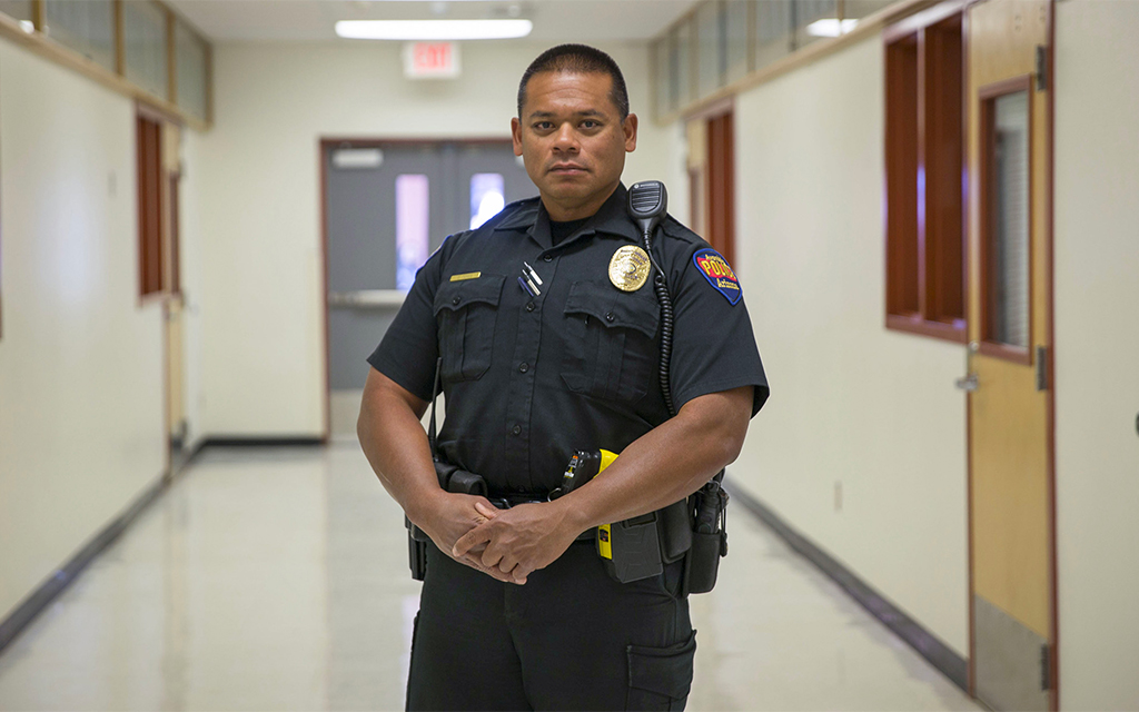 Officer Edward Toves, shown in a 2018 file photo, when he worked at Westview High School as a school resource officer. His job included visiting classes to teach students about the law. (File photo by Faith Miller/Cronkite News)