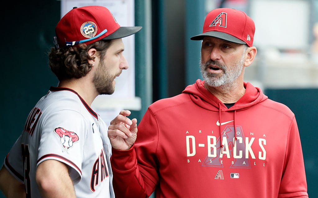 Arizona Diamondbacks manager Torey Lovullo, talking with pitcher Zac Gallen, has helped put the team in a position to make the postseason for the first time since 2017. (Photo by Duane Burleson/Getty Images)