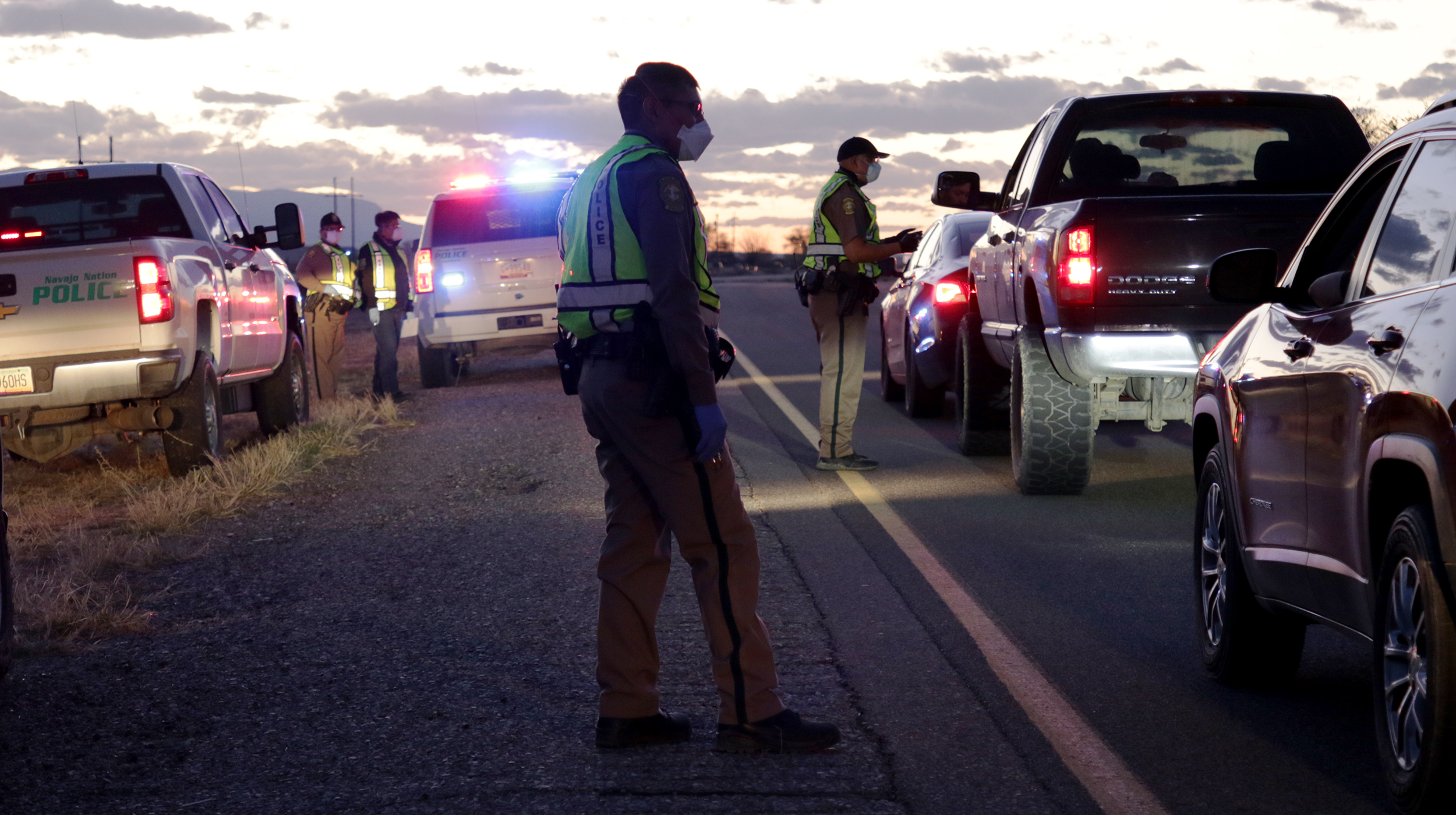 The Navajo Police Department has been holding checkpoints to share information about the curfew order on the Navajo Nation. (Courtesy of Farmington Daily Times/Noel Lyn Smith)

