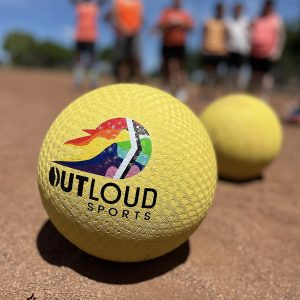 OutLoud Sports play with personalized kickballs during LGBTQIA+ league play. (Photo courtesy of OutLoud Sports Facebook page)