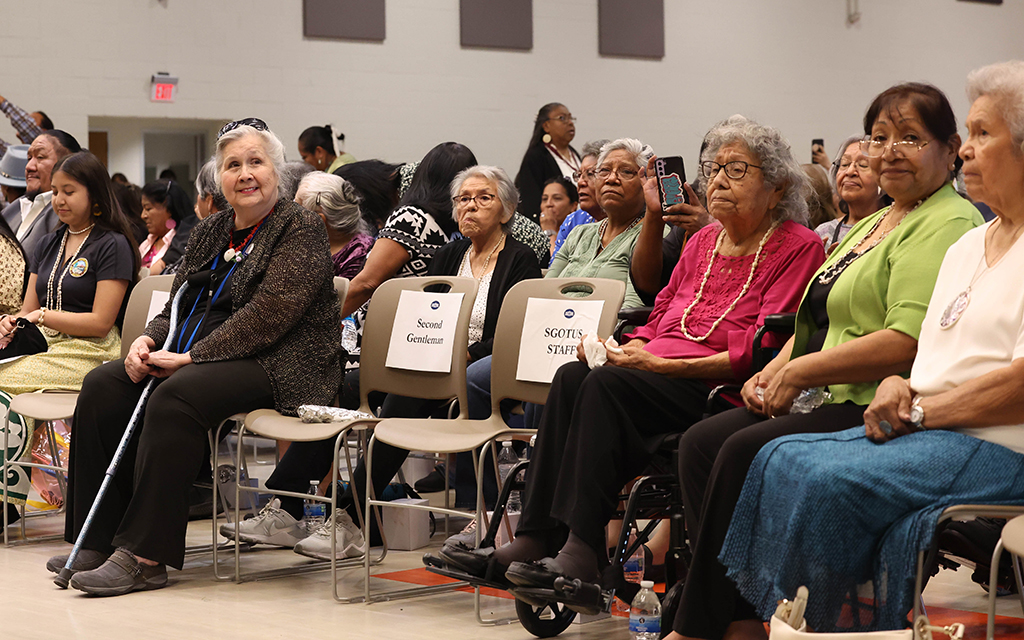 Members of the Gila River Indian Community gather at Gila Crossing Community School to welcome Vice President Kamala Harris. (Photo by Evelin Ruelas/Cronkite News)