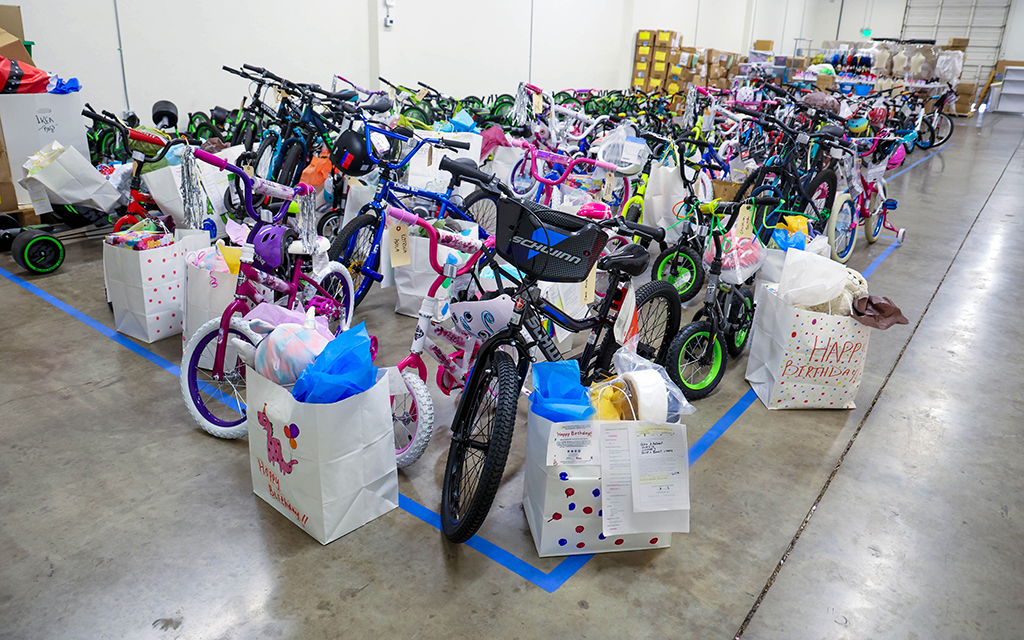 Arizona Helping Hands provides birthday gifts to foster children across the state. The gifts can include bikes, clothes, toys, books and other goodies. (Photo by Evelin Ruelas/Cronkite News)