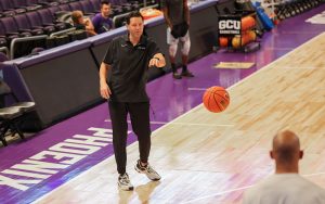 As GCU men's basketball coach Bryce Drew prepares his revamped roster for the upcoming season, the team's shift toward a taller and more physical lineup aims to elevate their performance to the national stage. (Photo by Griffin Greenberg/Cronkite News)