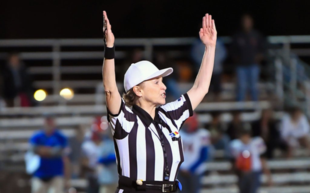 Referee signaling touchdown
