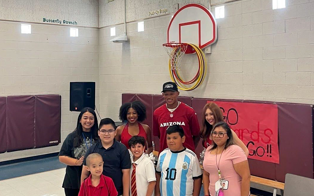 Arizona Cardinals quarterback Josh Dobbs shares his inspiring message of resilience with students at Lincoln Elementary School during the Milk and Cookies Reading Program. (Photo by Cody Marmon/Cronkite News)