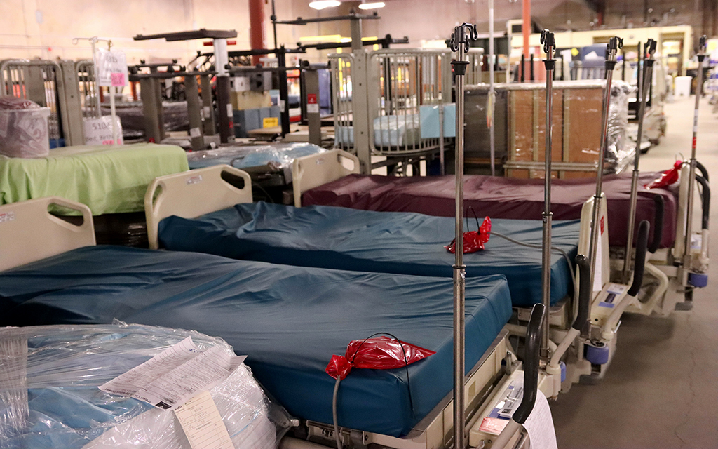 Donated hospital beds sit on the second floor of the Project C.U.R.E. distribution center in Tempe on Fri. Oct. 20, The beds will eventually be sent to different countries for medical relief. (Photo by Angelina Steel/Cronkite News)