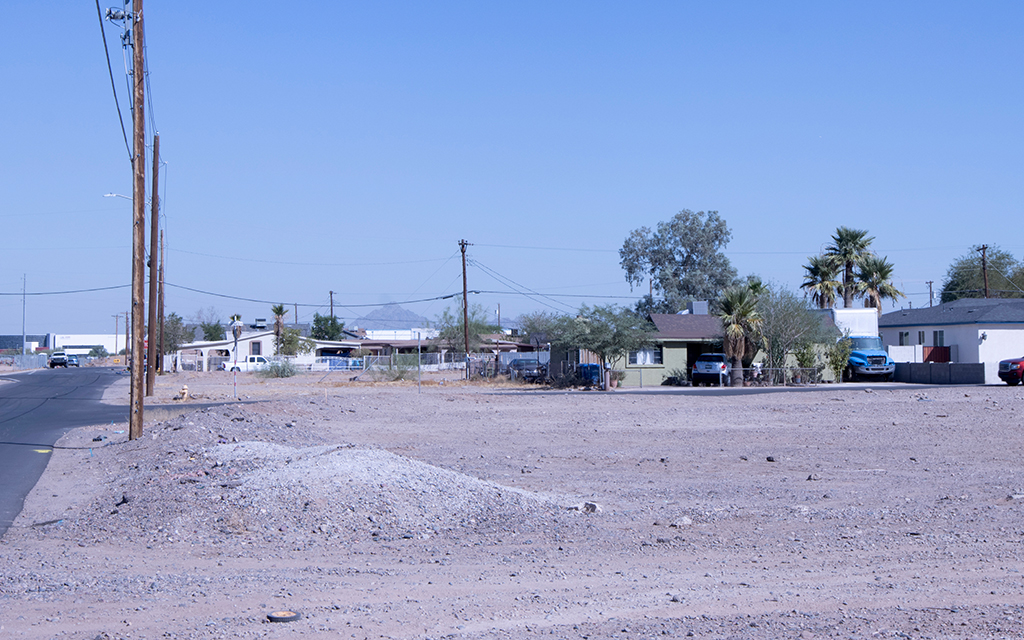 A lack of foliage in some Phoenix neighborhoods can create a heat island effect, causing the affected areas to be several degrees hotter than other neighborhoods. (Photo by Hunter Fore/Cronkite News)