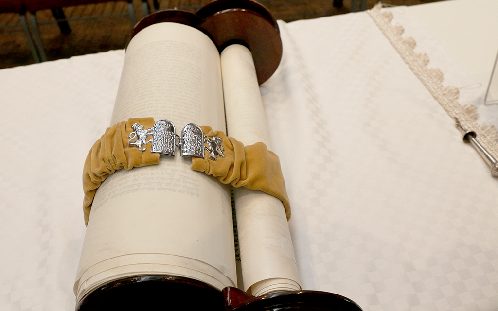 The Torah at Temple Kol Ami is pictured last month during the Jewish High Holy Days. “Today was one of the gravest and most devastating days in Israel’s history,” Temple Kol Ami Rabbi Jeremy Schneider wrote in a message to synagogue members. (File photo by Jacob Snelgrove/Cronkite News)