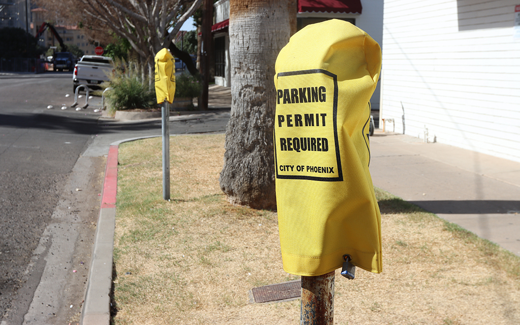 Several downtown Phoenix parking meters are denoted as permit parking only. (Photo by Hunter Fore/Cronkite News)
