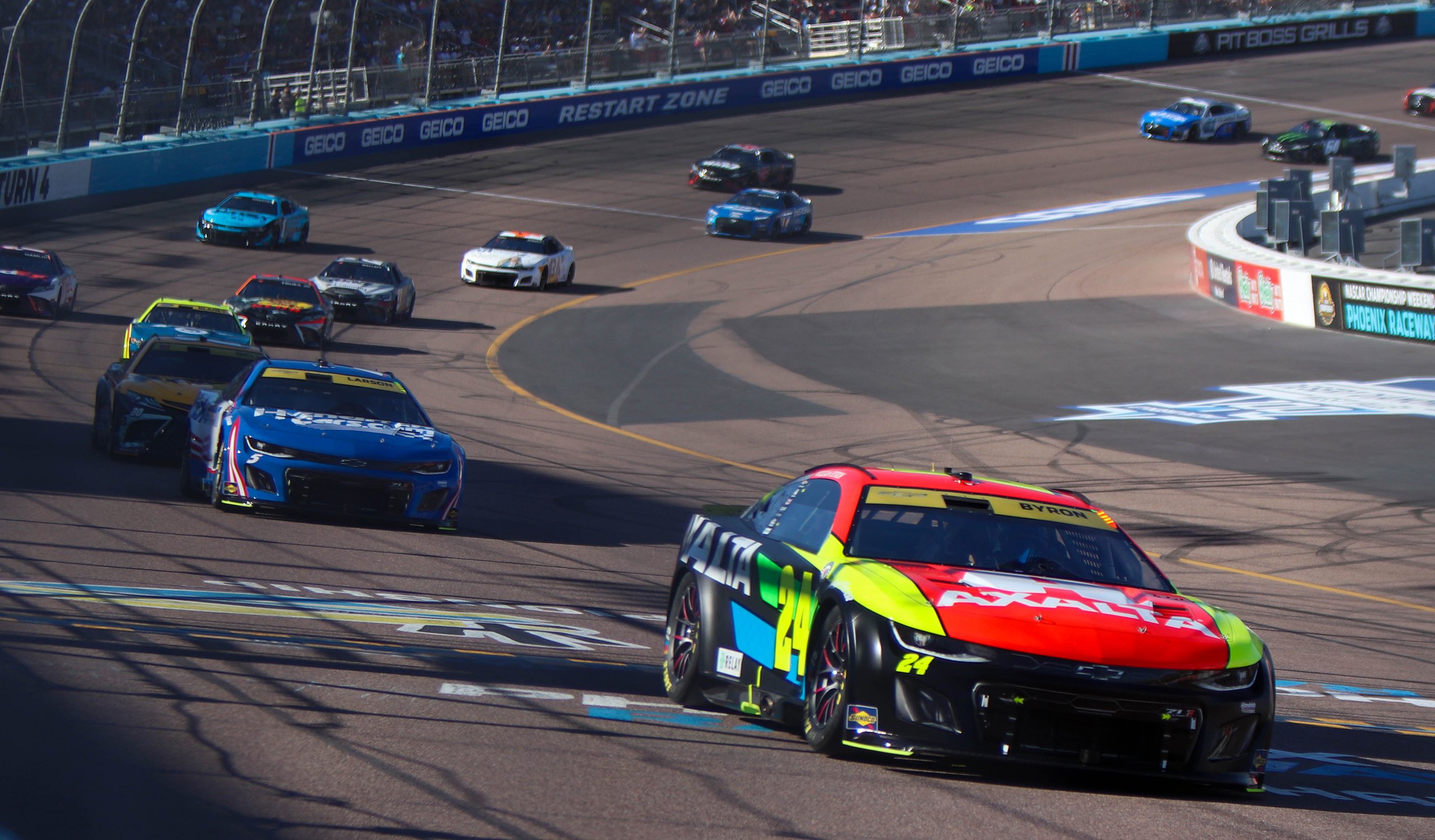 Chevrolet driver William Byron (24) leads the pack across the start/finish line at Phoenix Raceway Sunday in Avondale. (Photo by Reece Andrews/Cronkite News)
