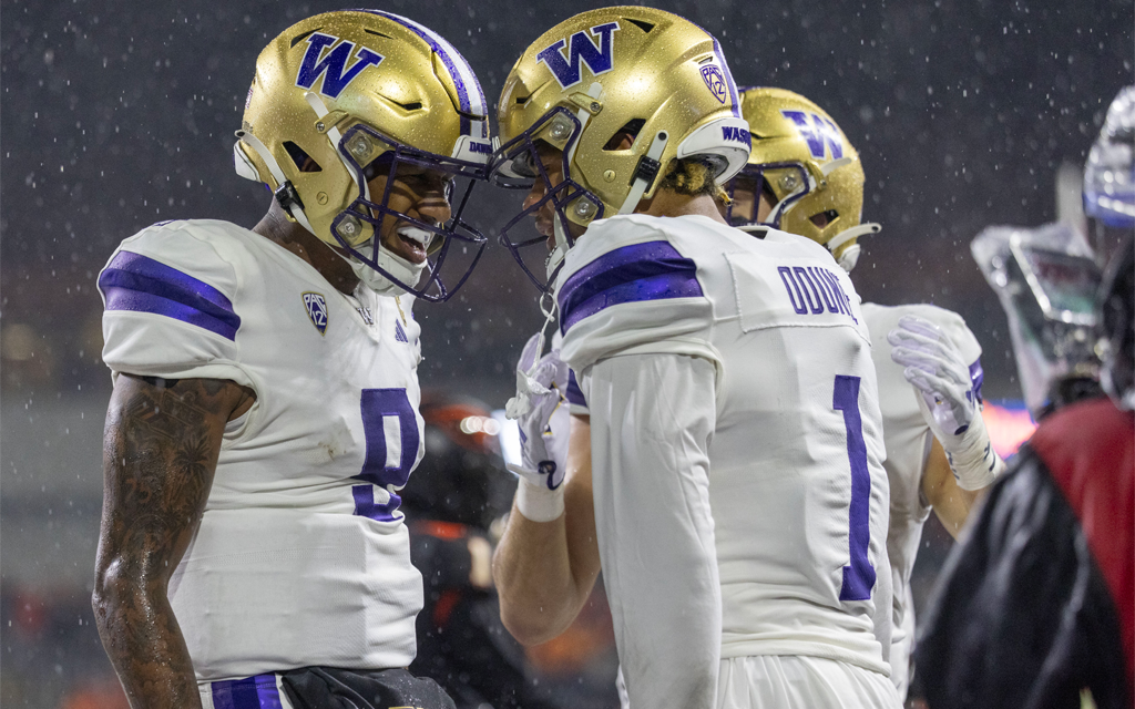 Michael Penix Jr., left, and No. 4 Washington carry the hopes of a College Football Playoff berth and rewriting the postseason narrative for the resurgent Huskies. (Photo by Tom Hauck/Getty Images)