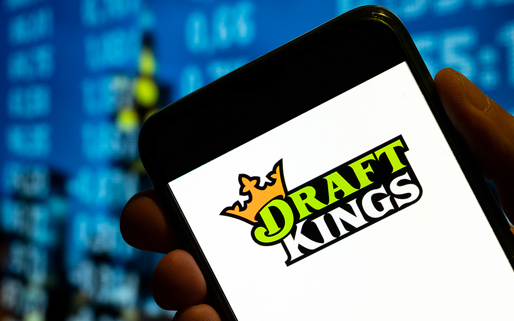 DraftKings continues to shape the gaming landscape with its innovative platform that offers fans a blend of strategy and excitement. (Photo Illustration by Budrul Chukrut/SOPA Images/LightRocket via Getty Images)