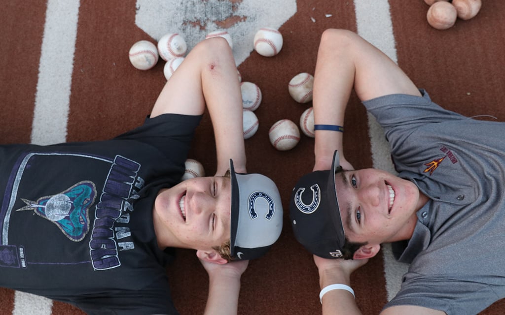 Brothers Dallas Hairston, left, and London Hairston pursue their own paths at Casteel High School in hopes of continuing the family legacy in the major leagues. (Photo by Daniel Stipanovich/Cronkite News)