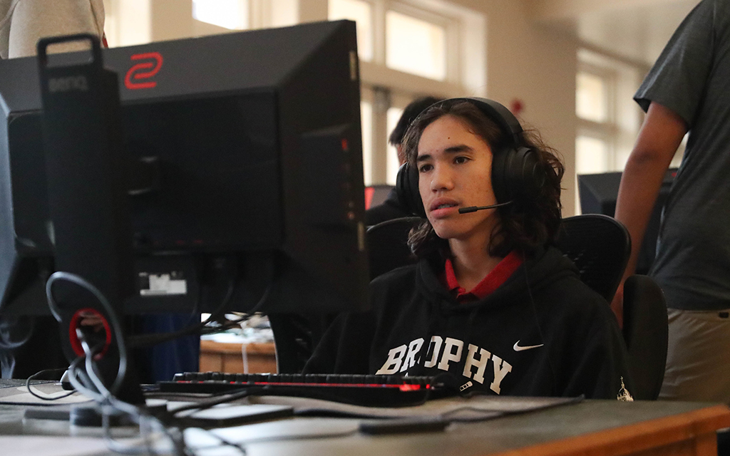 Students from Brophy College Preparatory fine-tune their strategies as they get ready to compete in popular titles like Rocket League and Super Smash Bros. Ultimate in the upcoming Arizona high school esports season. (Photo by Daniella Trujillo/Cronkite News)