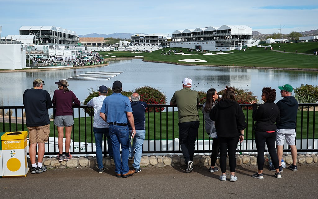 Although the weather looks perfect as fans enjoy the 18th hole at TPC Scottsdale Monday, a storm front is expected to move in Tuesday and stay for much of the WM Phoenix Open. (Photo by Bennett Silvyn/Cronkite News)