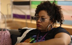 Danielle Fowler at the Thornhill Lopez Center on 4th in Tucson describes how people often have to hide their queer identities to stay safe. (Photo by Jack Orleans/Cronkite News)
