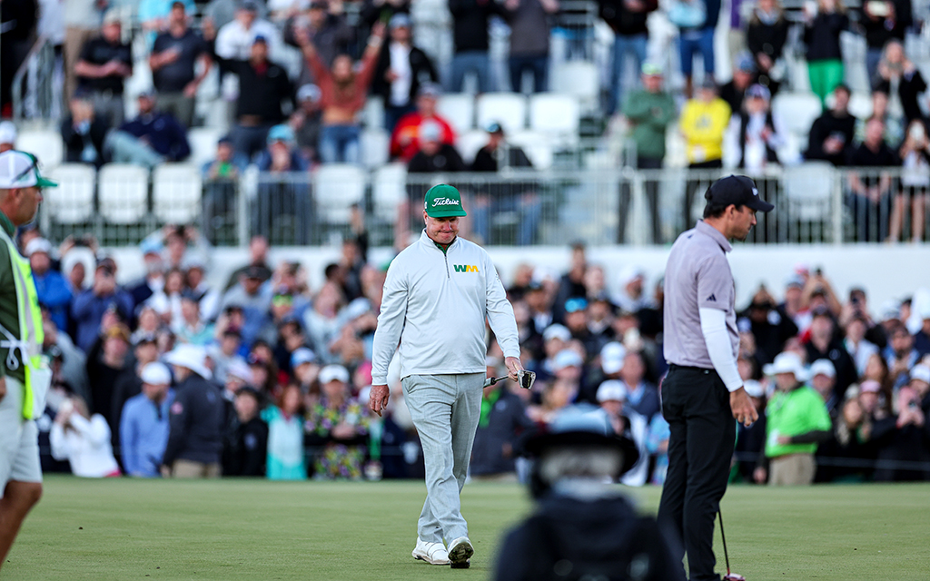 Charley Hoffman walks defeated after missing his birdie putt during the second playoff hole at the WM Phoenix Open.(Photo by Ethan Briggs/Cronkite News)