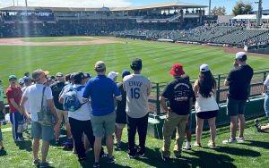 Los Angeles Dodgers fans flock to Surprise Stadium to witness the MLB spring training debut of pitcher Yoshinobu Yamamoto, who signed in December. (Photo by James Lotts/Cronkite News)