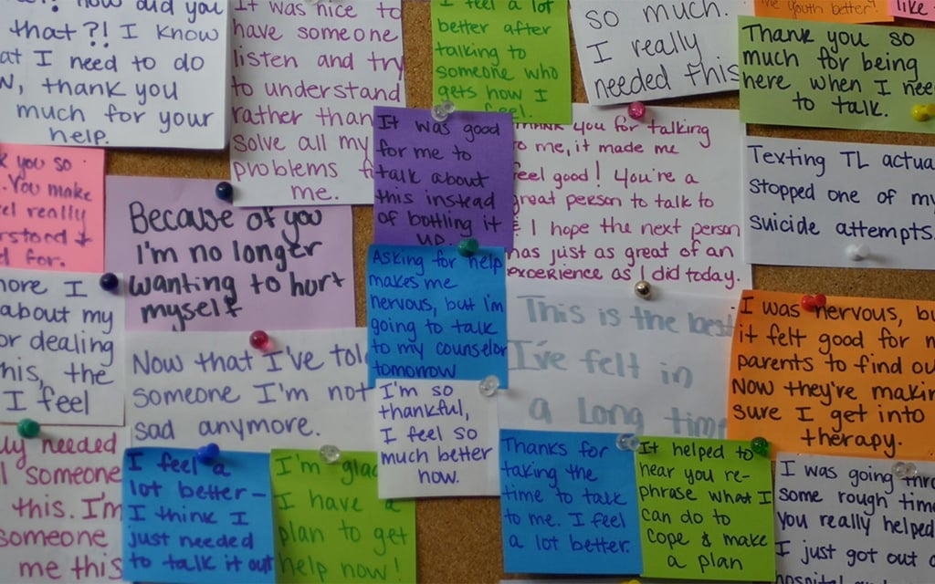 Teen Lifeline counselors receive messages from teenagers who have called to express their gratitude. The organization keeps the messages and hangs them in their hotline room. (Photo courtesy of Teen Lifeline)