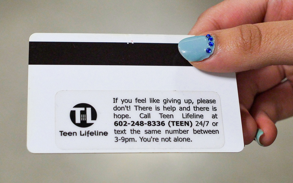 Student school ID cards in Arizona list Teen Lifeline’s phone number. The number is reachable 24/7. (Photo courtesy of Teen Lifeline)