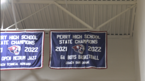 Perry High School boys basketball hopes to add another AIA state championship banner to the rafters for the third straight season. (Screen grab by Brandon Tran/Cronkite News)