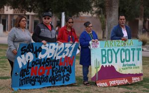 From left, Alondra Ruiz Vazquez, Raul Cordero, Sylvia Herrera, Maria Del Rayo and Jorge Flores boycott legislation that critics are calling “SB 1070 2.0” at the Arizona State Capitol on Feb. 1, 2024. (Photo by Marnie Jordan/Cronkite News)