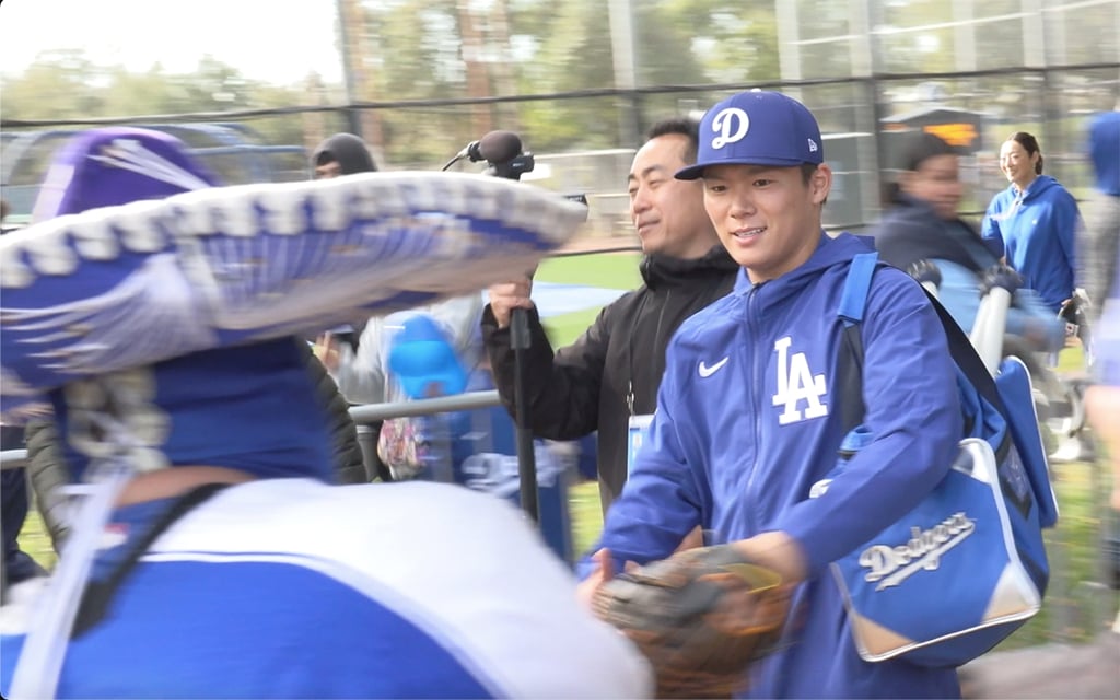 As the Dodgers bolster their lineup with star signings like Yoshinobu Yamamoto, fans anticipate nothing less than a World Series title. (Video screengrab by Dorian Zavala/Cronkite News)