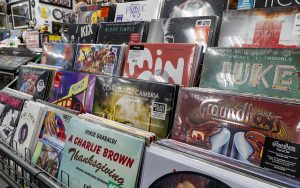 Leftover exclusive vinyls from past Record Store Days fill a section in Asylum Records. Photo taken in Chandler on Jan. 24, 2024. (Photo by Emily Mai/Cronkite News)