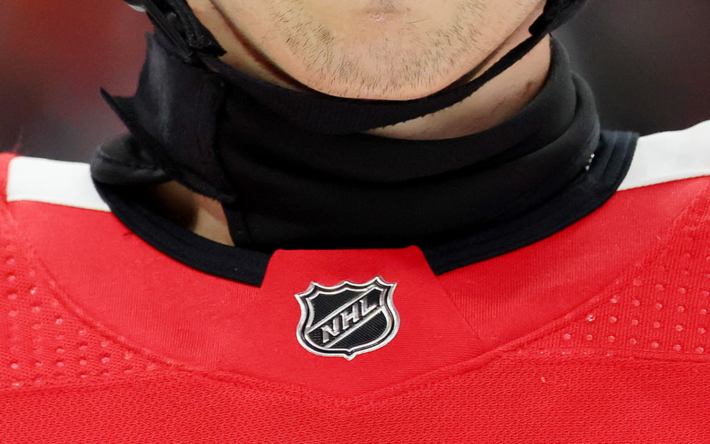 In the wake of recent tragedies, youth hockey players and supporters embrace the mandatory use of neck guards. The NHL currently does not have any such mandate for players. (Photo by Michael Reaves/Getty Images)