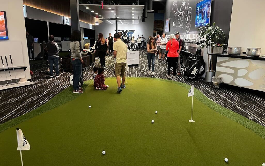 Outside of the three challenges, guests were able to practice their putting skills at the shop’s putting green to fully fine tune their game. (Photo by Madison Breuer/Riester)