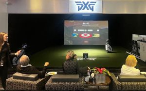 To showcase the tour for fans, LPGA Tour Game Night at PXG Scottsdale welcomed tour players, too. Here guests await the Bullseye, one of the three simulator challenges they could take part in to showcase their skills. (Photo by Madison Breuer/Riester)