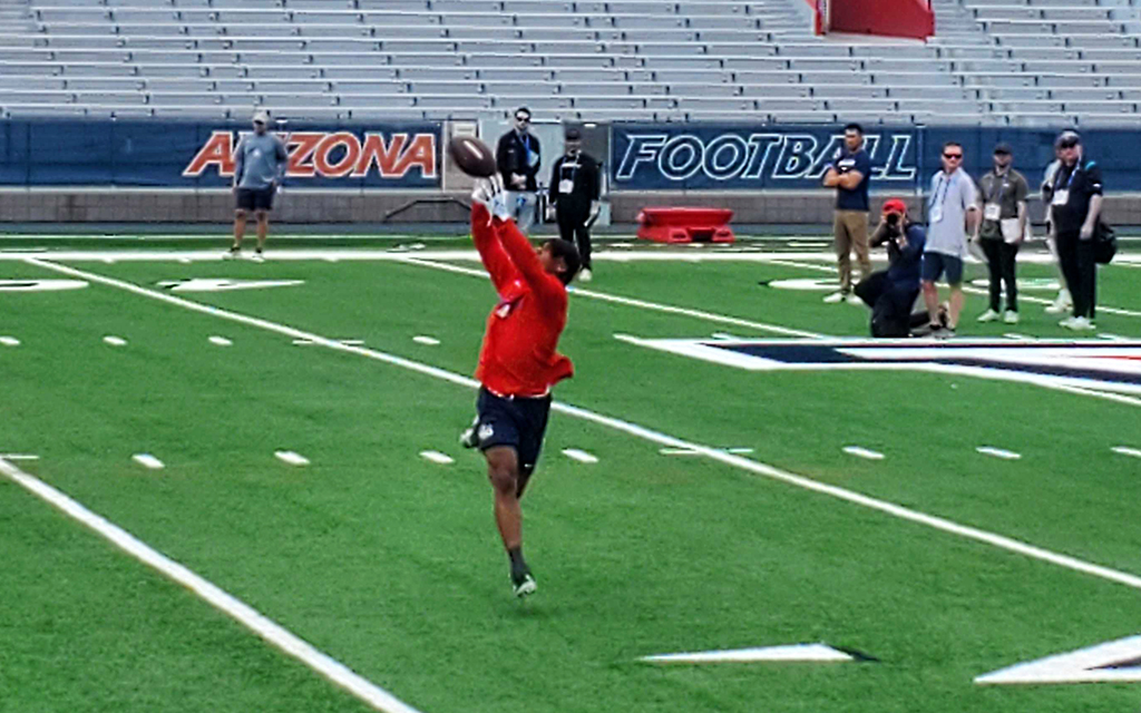 Maricopa native Jacob Cowing showcases his speed and skills during receiver drills Thursday at Arizona's Pro Day. (Photo by John Busker/Cronkite News)