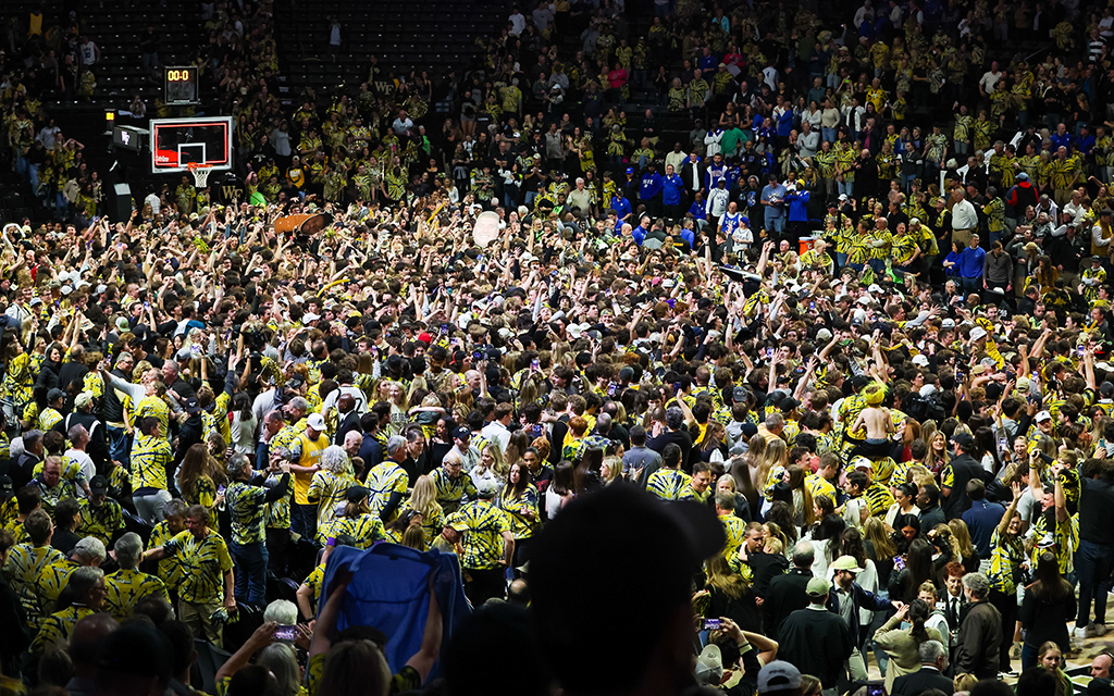 Wake Forest fans storm the court after a basketball game against Duke at Lawrence Joel Veterans Memorial Coliseum in Charlotte, North Carolina, recently. More and more incidents have raised questions about regulations. (Photo by David Jensen/Icon Sportswire via Getty Images)