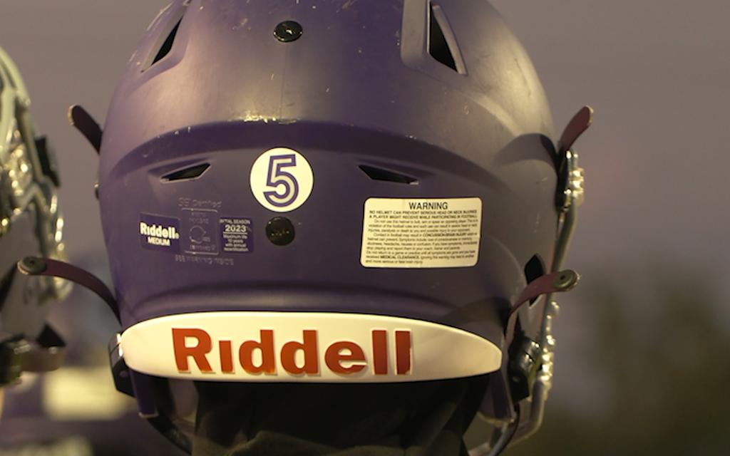 Cesar Chavez High School players wore No. 5 on their helmets in honor of Christopher Hampton during the 2023 football season. Hampton’s family filed a $50 million lawsuit Monday. (File photo by Beatriz Martinez/Cronkite News)