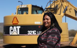 Vaya Chin resident Tonya Joaquin on Feb. 13 at the construction site that will bring faster internet to her home.(Photo by <a href="https://cronkitenews.azpbs.org/people/crystal-n-aguilar/" rel="noopener" target="_blank">Crystal Aguilar</a>/Cronkite News)