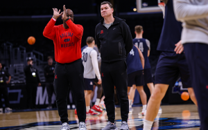 Tommy Lloyd observes attentively at the beginning of practice, preparing to make his second Sweet 16 appearance in three years as the head coach of the Arizona Wildcats. (Photo by Bennett Silvyn/Cronkite News)