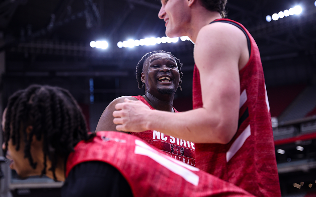 Senior forward DJ Burns shares his infectious smile while sharing a laugh with teammates during practice ahead of their Men’s Final Four showdown against Purdue. (Photo by Bennett Silvyn/Cronkite News)