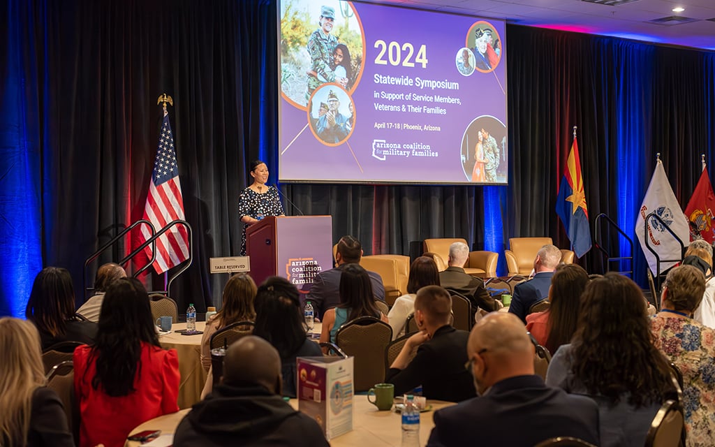 Nicola Winkel, project director at Arizona Coalition for Military Families, speaks during the general session of the Arizona Coalition for Military Families' 14th Annual Statewide Symposium in Phoenix on April 17. (Photo by Ashley Schulte/Arizona Coalition for Military Families)