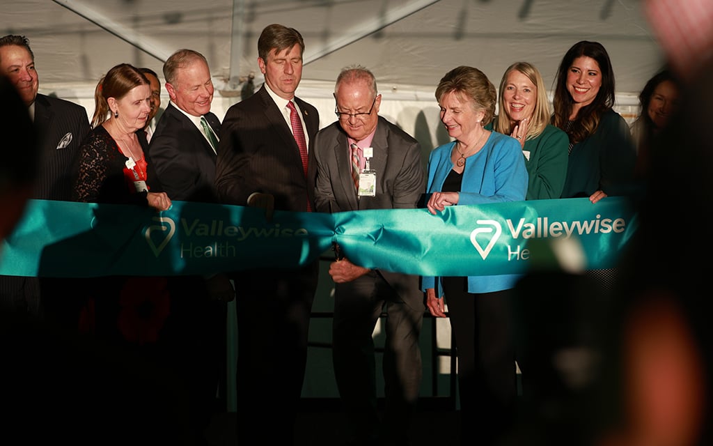 Speakers cut the ribbon at the opening of the new Valleywise Health medical center on April 3. (Photo by Jack Orleans/Cronkite News)