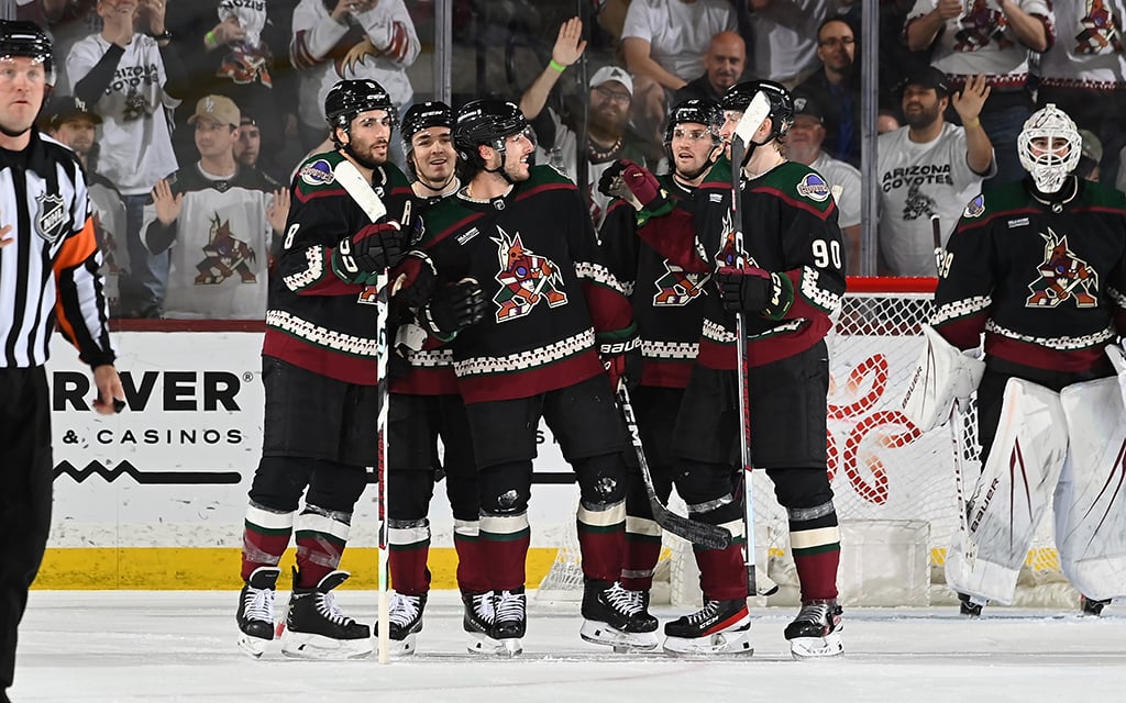 Arizona Coyotes players soak in the cheers from fans during their emotional sendoff game at Mullett Arena before relocating to Utah. (Photo by Norm Hall/NHLI via Getty Images)