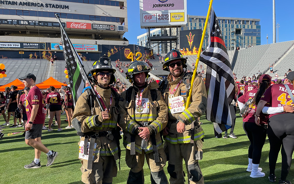 Valley firefighters Sergio Tosi, Brad Lerman and Nik Gazda were among the first responders to participate in the 20th annual Pat’s Run. They competed in full gear. (Photo by Anthony Remedios/Cronkite News)