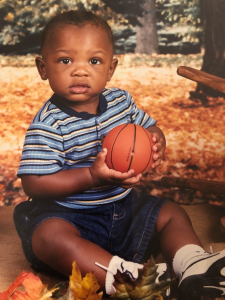 Even in his very early years, North Carolina State’s DJ Horne had a basketball in his hand. (Photo courtesy of Tivona Horne)