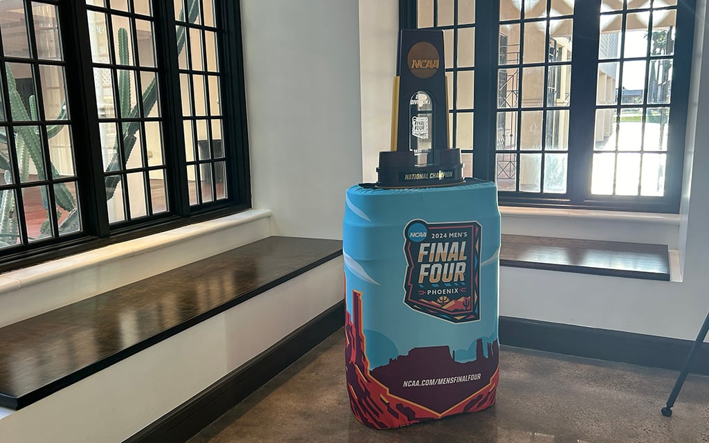 The NCAA men’s basketball championship trophy is showcased at the Heard Museum during the awards reception honoring the recipients of the NCAA Legends and Legacy Community Award. (Photo by Grace Del Pizzo/Cronkite News)