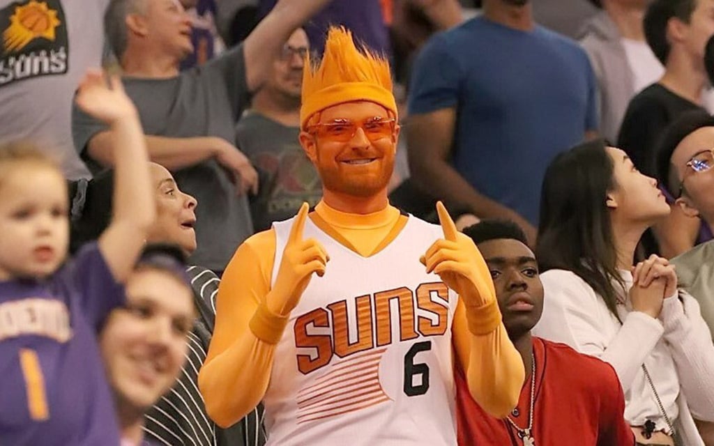 Patrick Battillo, a popular Suns superfan known as “Mr. ORNG’ as well as a Peoria High School basketball coach, was arrested Tuesday night on charge related to child sex crimes. (File photo by Dominic Rivera/Cronkite News)