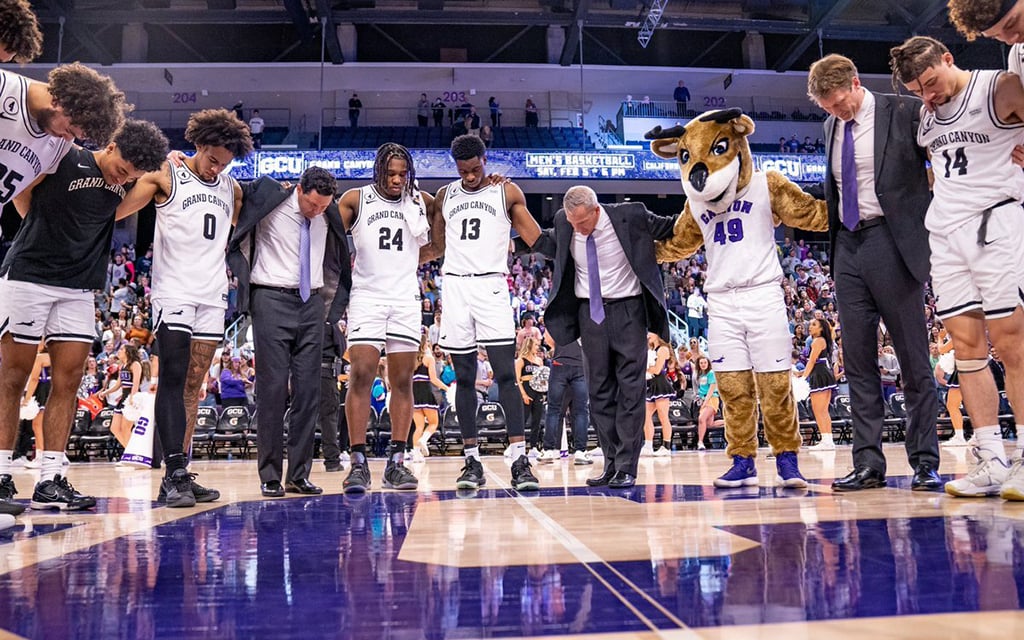 Members of the GCU men’s basketball team believe in not only playing together but praying together as a means to strengthen their team. (Photo courtesy of GCU Athletics)