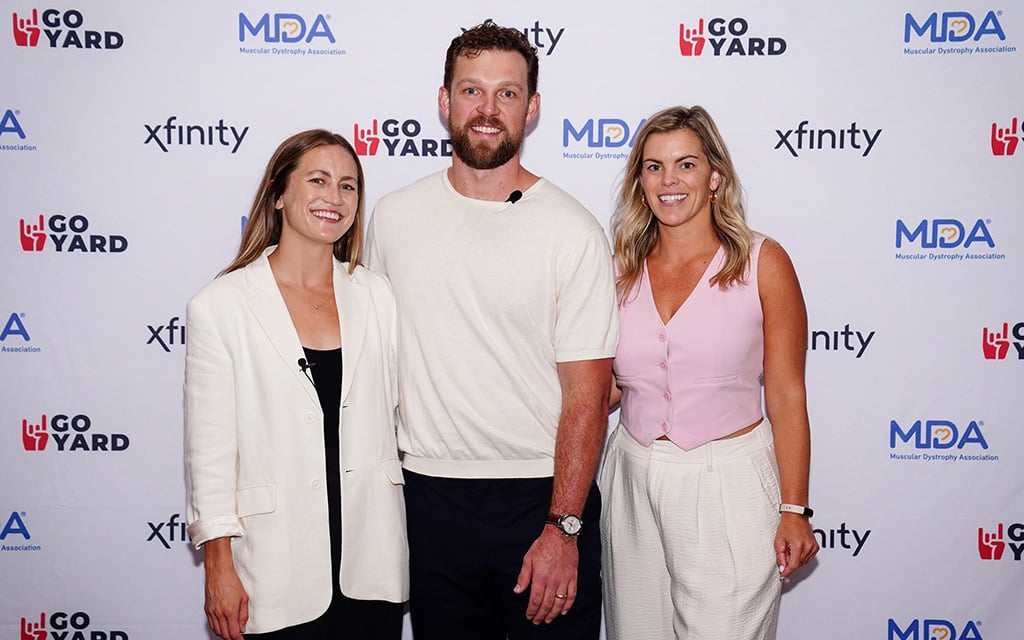 Rhys (middle) and Jayme Hoskins (left), known for their philanthropic efforts, host a muscular dystrophy fundraiser event in Philadelphia. (Photo courtesy of Philadelphia Phillies)